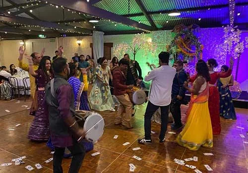 Dhol with bhangra and bollywood dancers